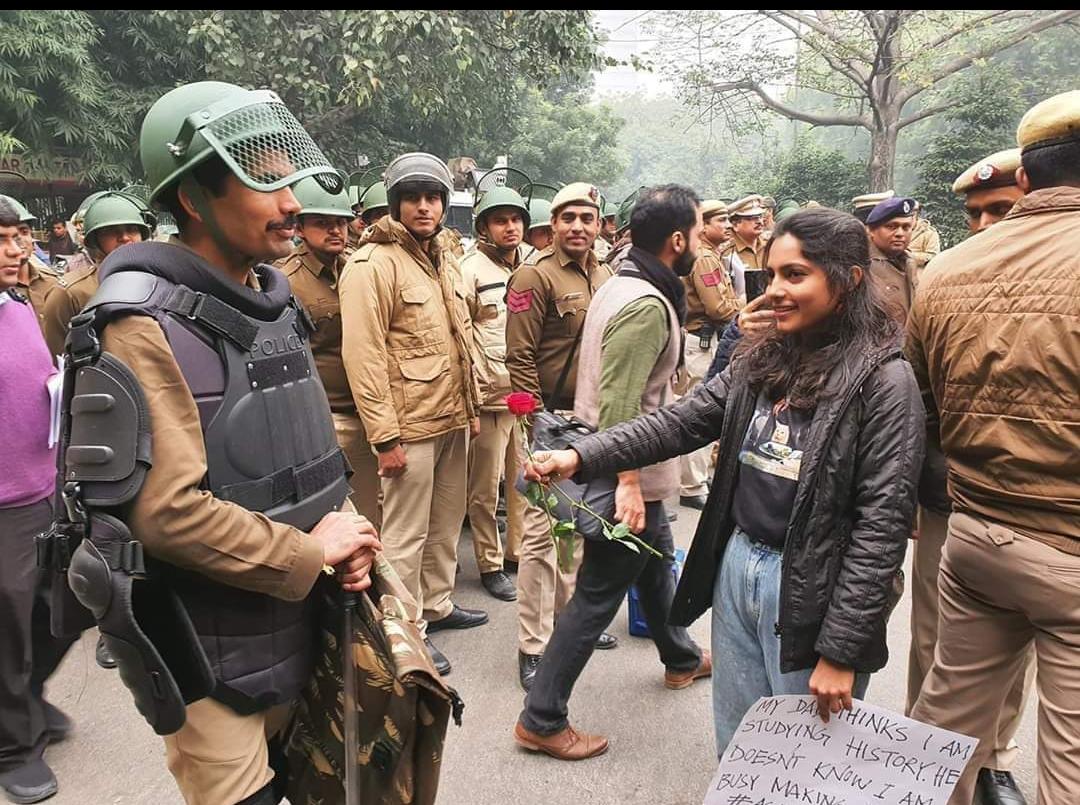 Protestors with flower