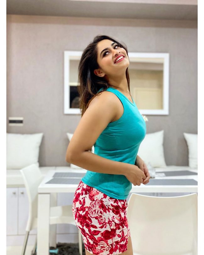 Shivani Narayanan Photos in a blue tank top